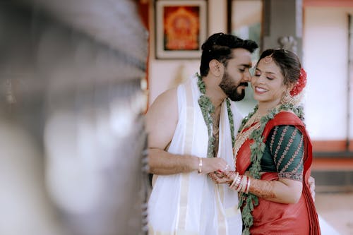 Smiling Couple in Traditional Clothing