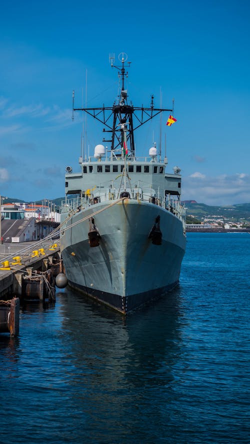 Military Ship Moored on Pier