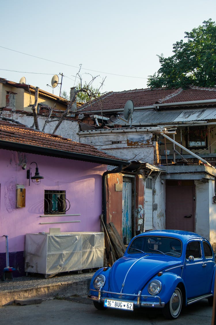 A Car By A House