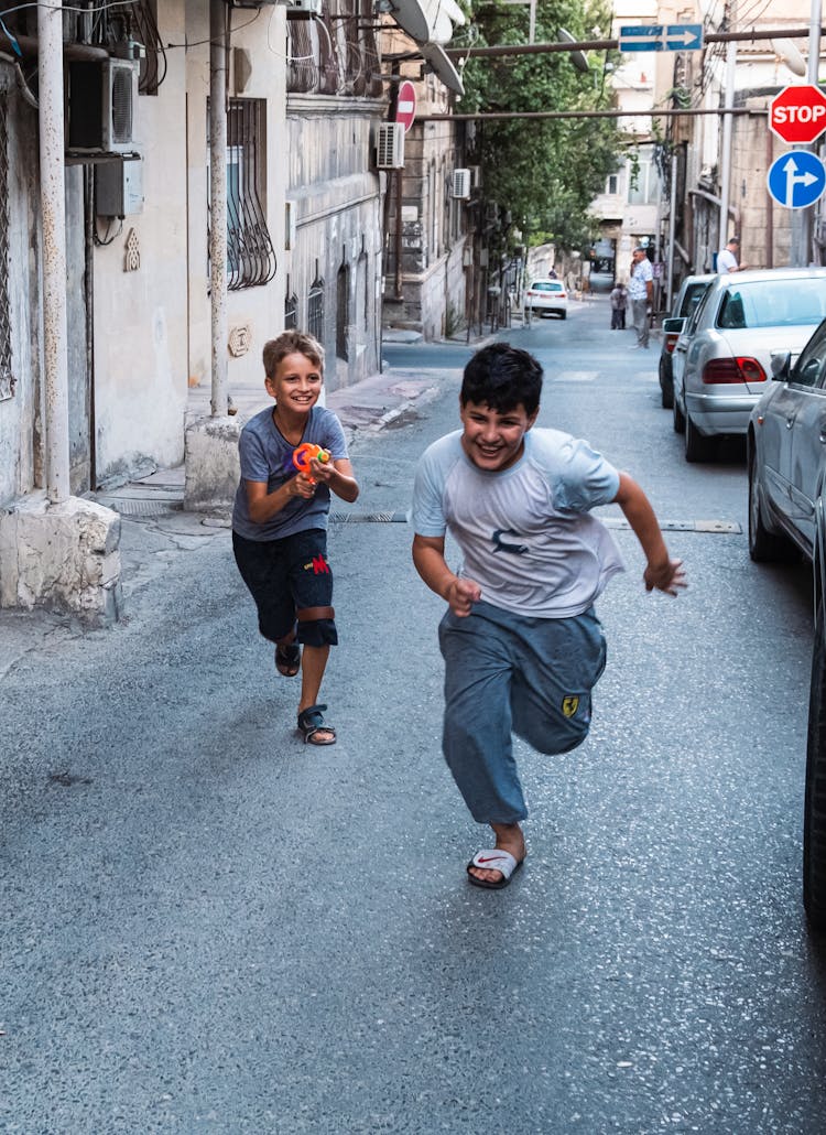 Kids Playing In A City