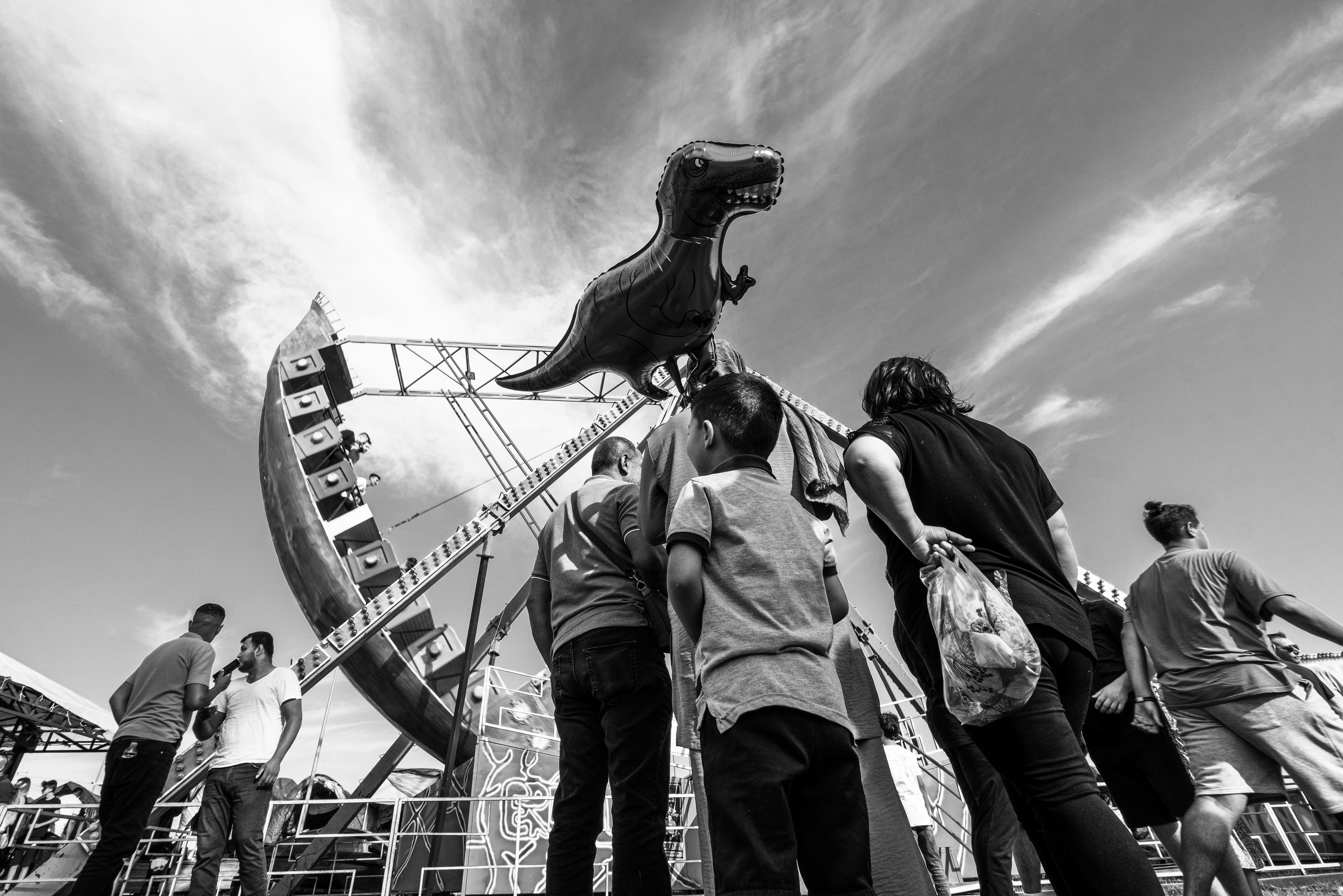 Men and Child at Amusement Park