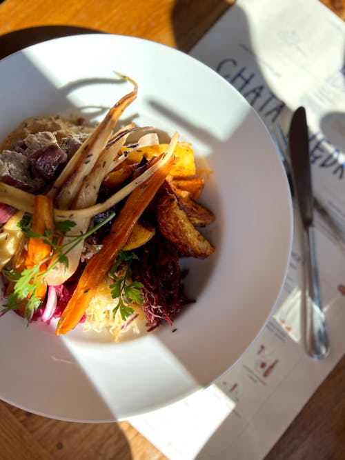 Delicious Dish on Plate on Restaurant Table