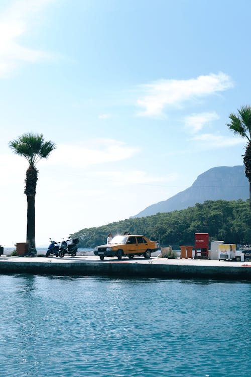 Vintage Car on Pier on Sea Shore