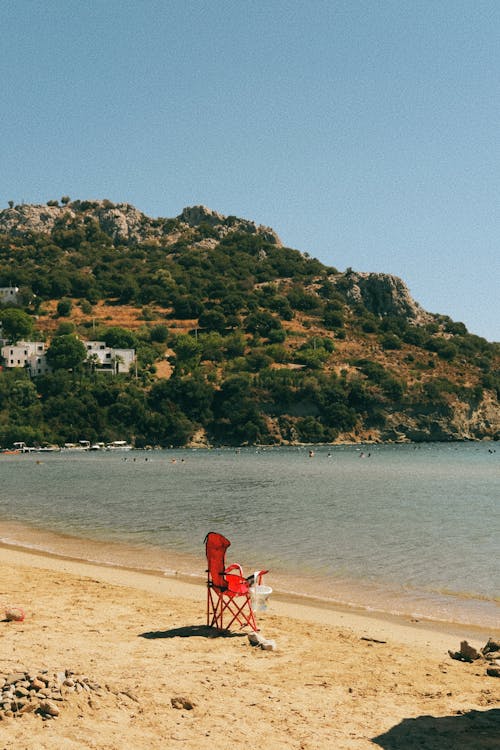 Chair on Sunlit Beach