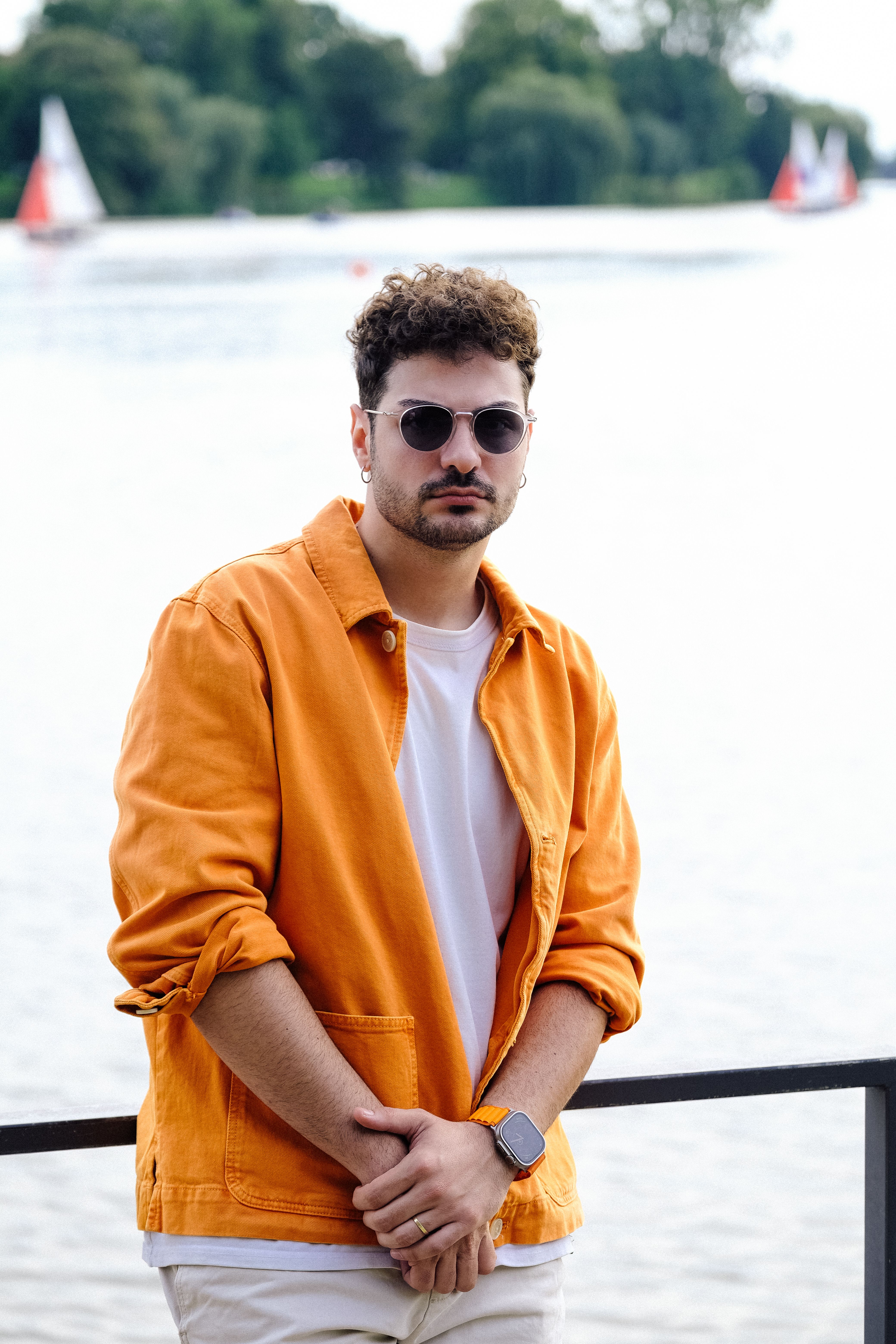 Man in Orange Shirt and Sunglasses · Free Stock Photo