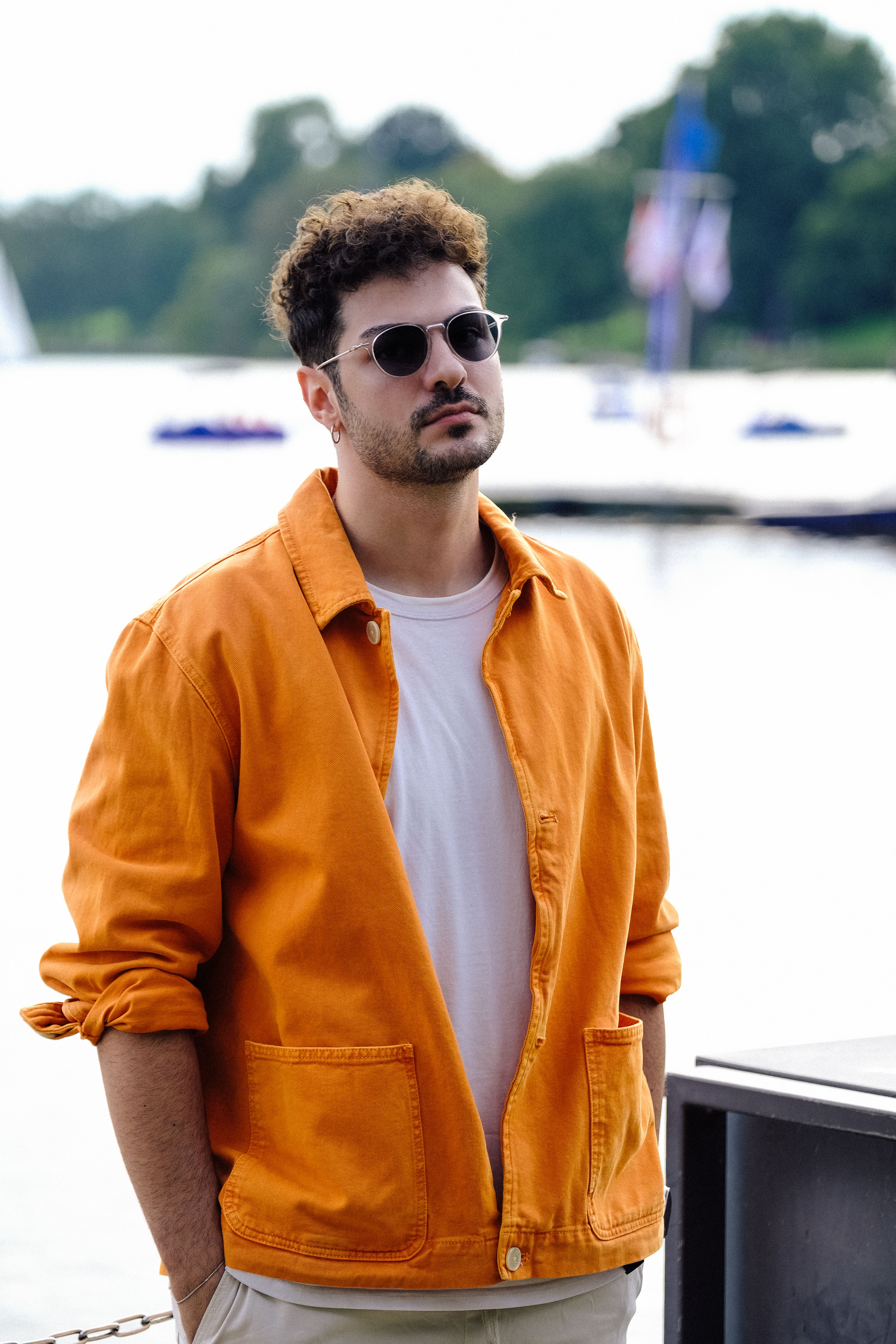 Portrait of Man in Orange Shirt and Sunglasses · Free Stock Photo