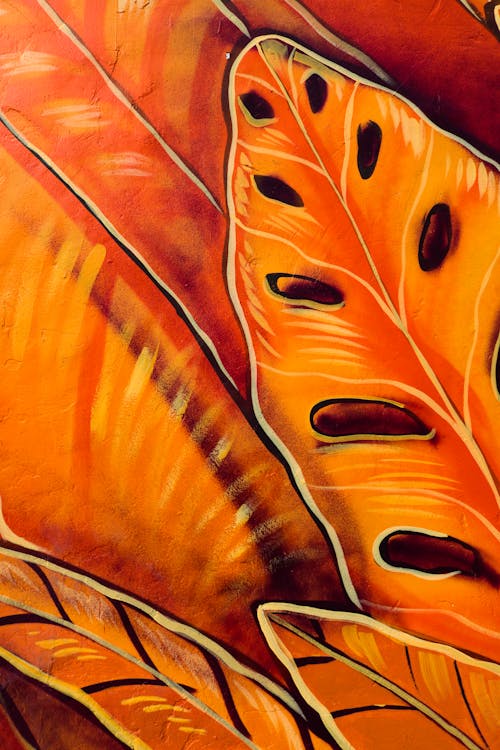 Close-up Photo Of A Painting Of Orange Leaves 