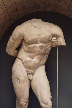 Headless marble sculpture depicting ancient Greek artistry at Kocaeli Museum, Turkey.