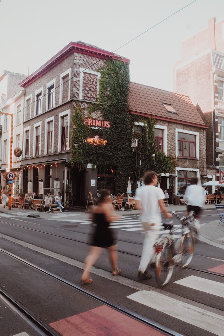 People On Pedestrian Crossing In Town