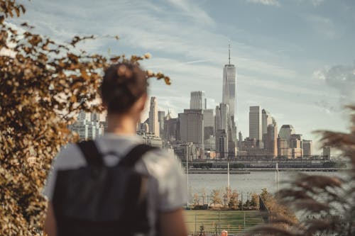 Man Looking at a View of New York Cityscape 