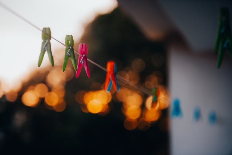 Pegs Hanging From String