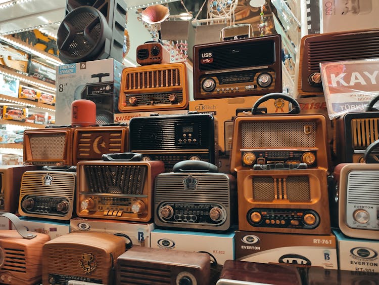 Stack Of Vintage Radios In An Electronics Store