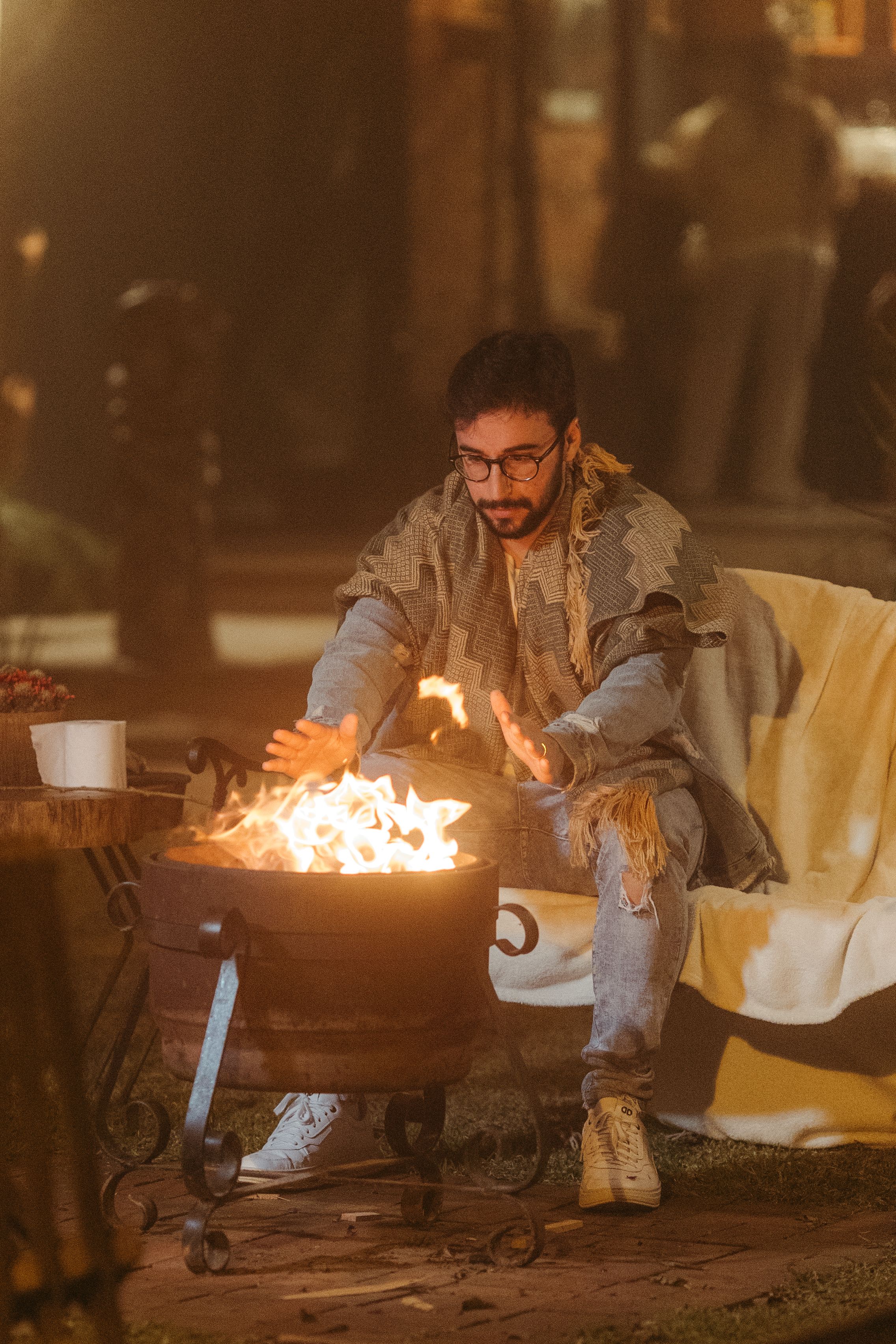 Man Warming his Hands over the Fire in a Park · Free Stock Photo