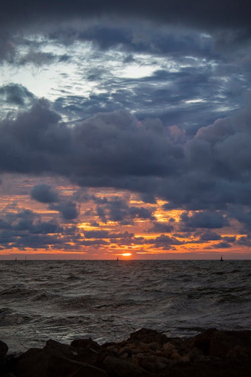 Cloudy Sky Above the Stormy Sea at Sunset