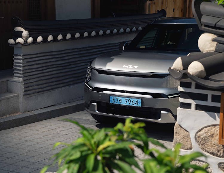 Electric Car Parked On Driveway