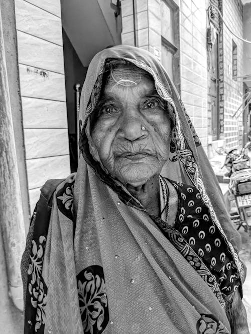 Portrait of Elderly Woman in Headscarf