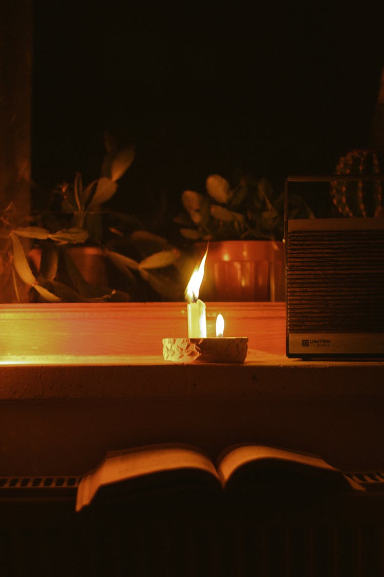 Burning Candle In A Room