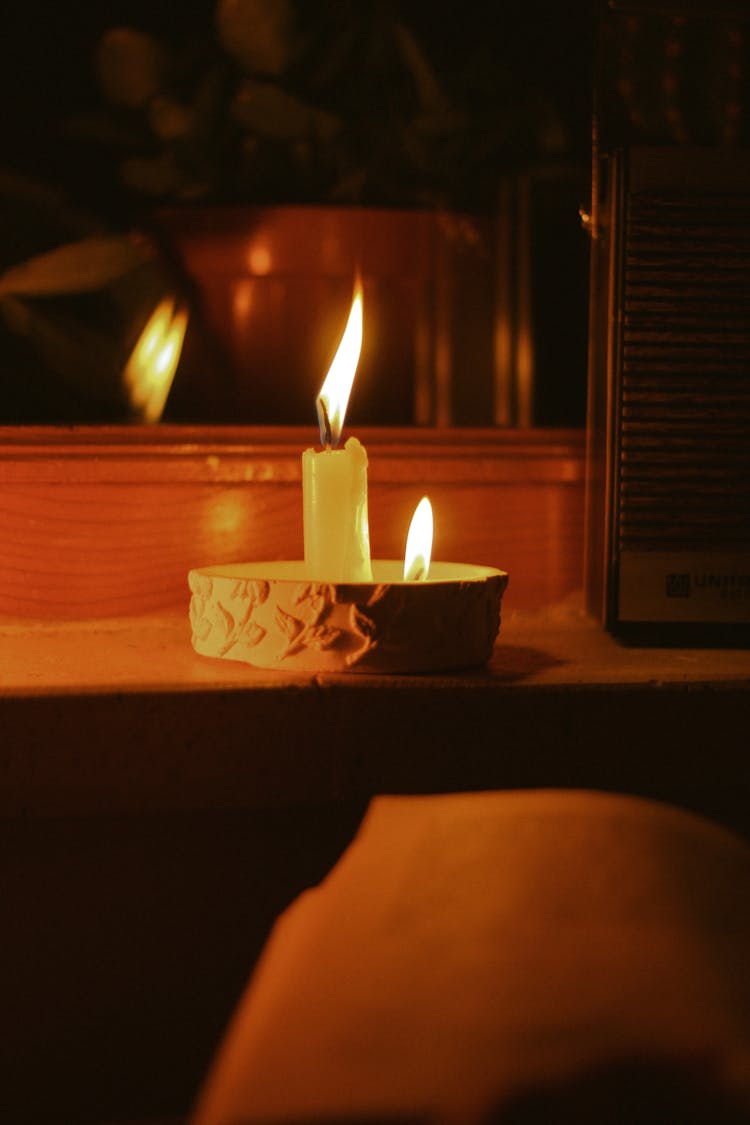 Burning Candle In A Room