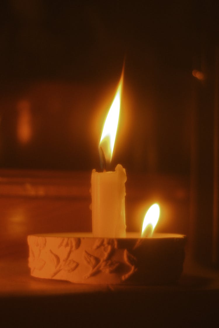 Burning Candle In A Room