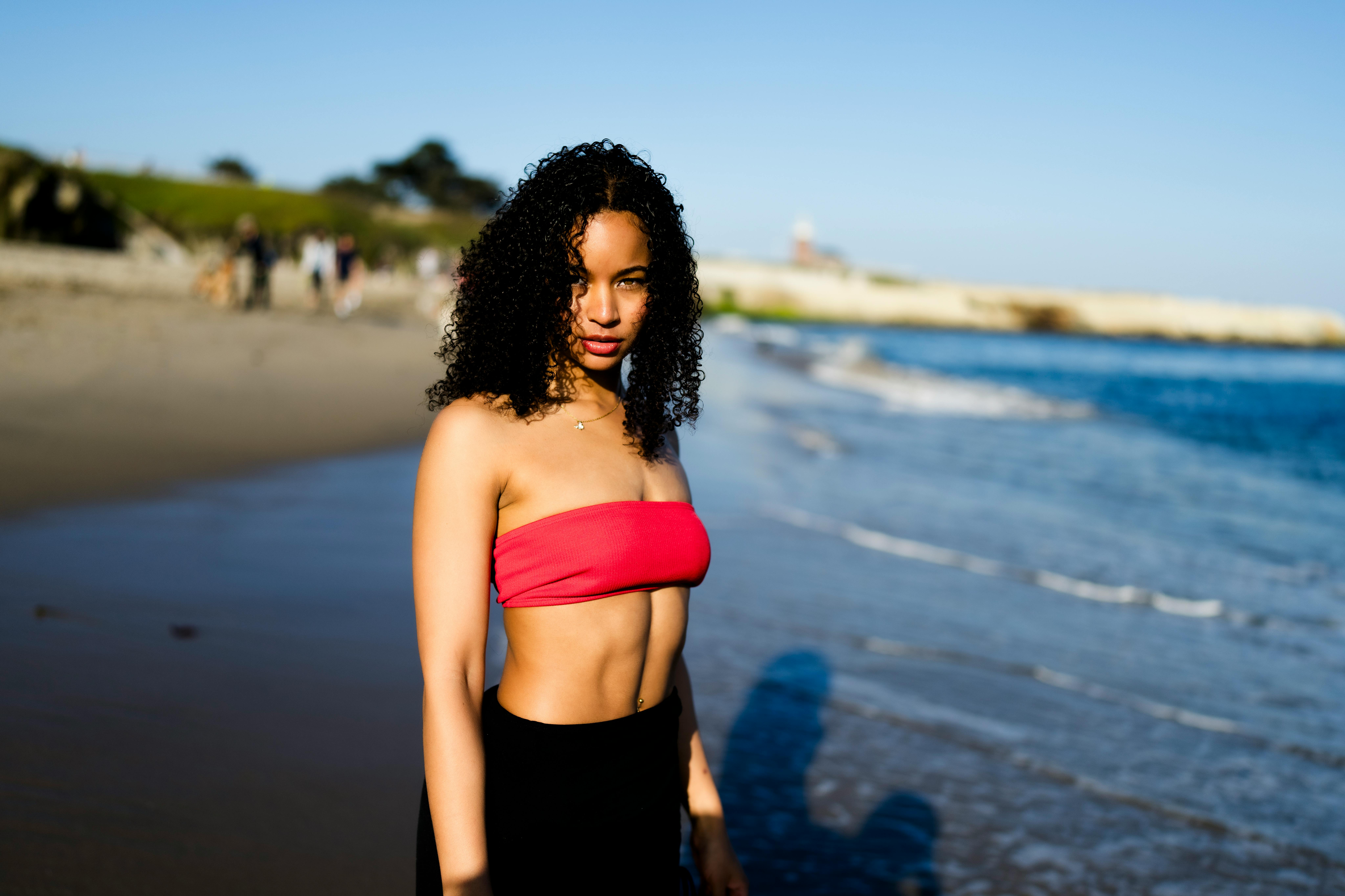 Portrait of beautiful African American woman in bikini enjoying