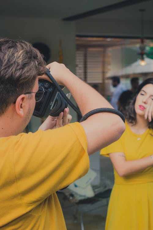 Free Man Taking Picture Of Woman Stock Photo