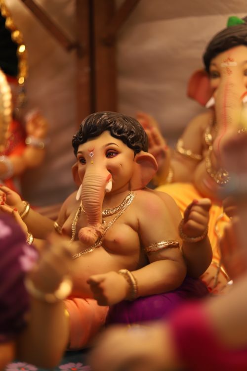 Free Vibrant sculptures of Lord Ganesh displayed during a Hindu festival. Stock Photo