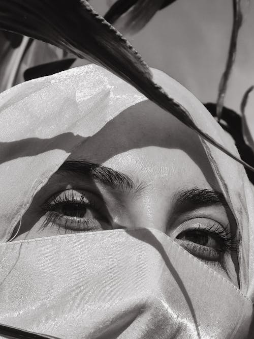 Eyes of Woman Wearing Headscarf in Black and White