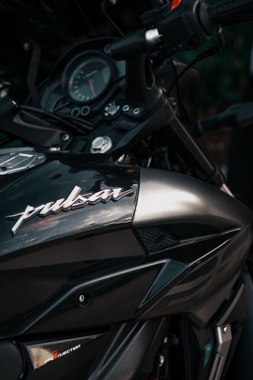 Free Detailed view of a black Pulsar motorbike captured outdoors in Istanbul, Türkiye. Stock Photo
