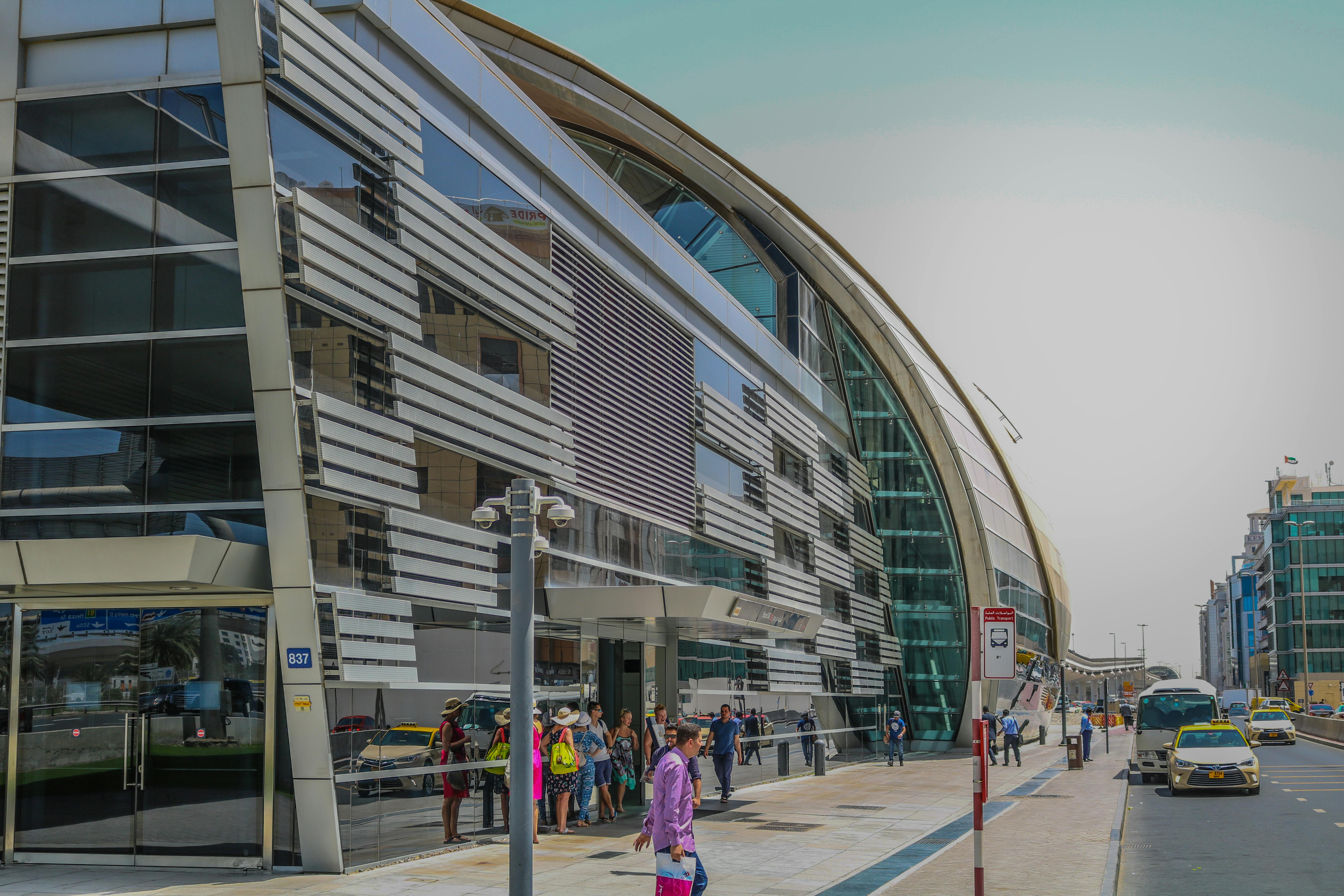 A spooky, dark, and empty hallway inside an old mansion.
