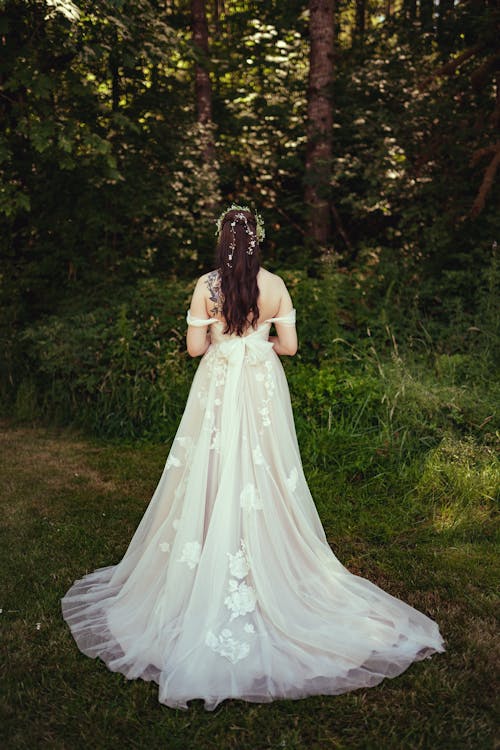 Bride in Gown in Summer Forest