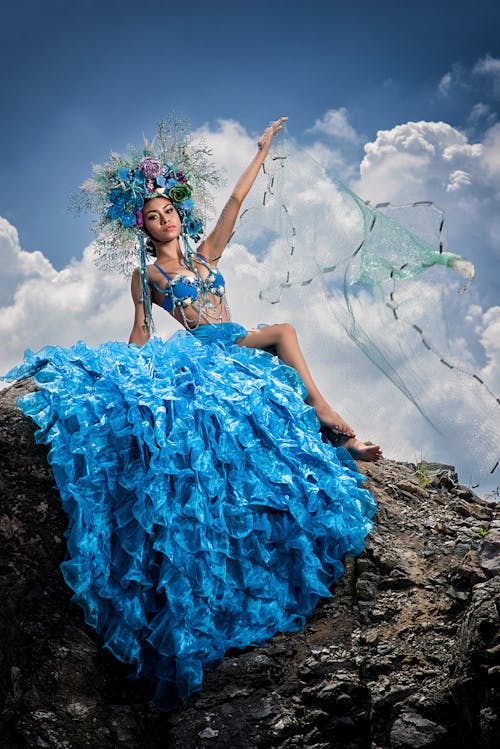 Woman Posing in a Blue Dress