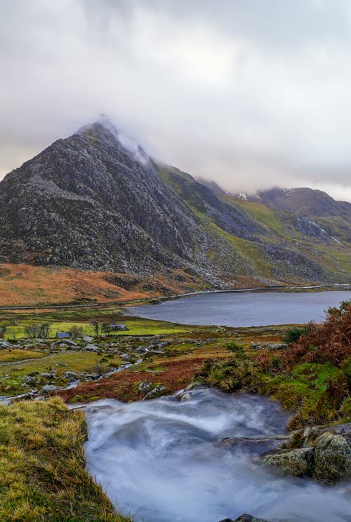 Lake in Valley in Mountains Landscape