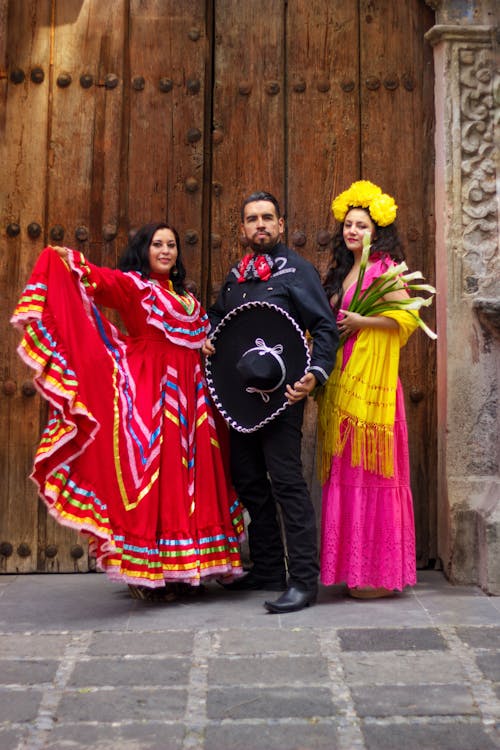 Women and Man Posing in Traditional, Mexican Clothing