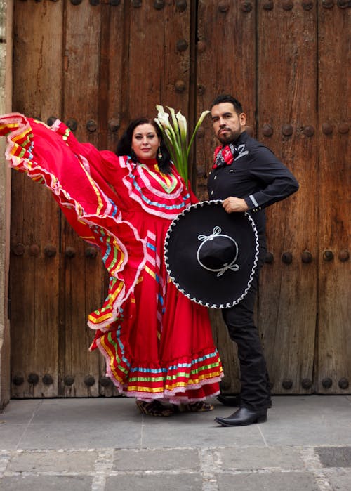 Woman and Man Posing in Traditional, Mexican Clothing