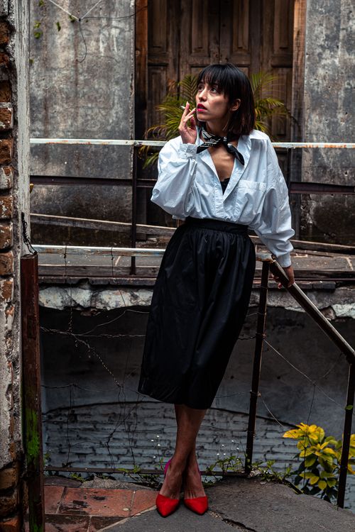 cigarette skirt Elegant Woman in White Shirt Smoking Cigarette · Free Stock Photo