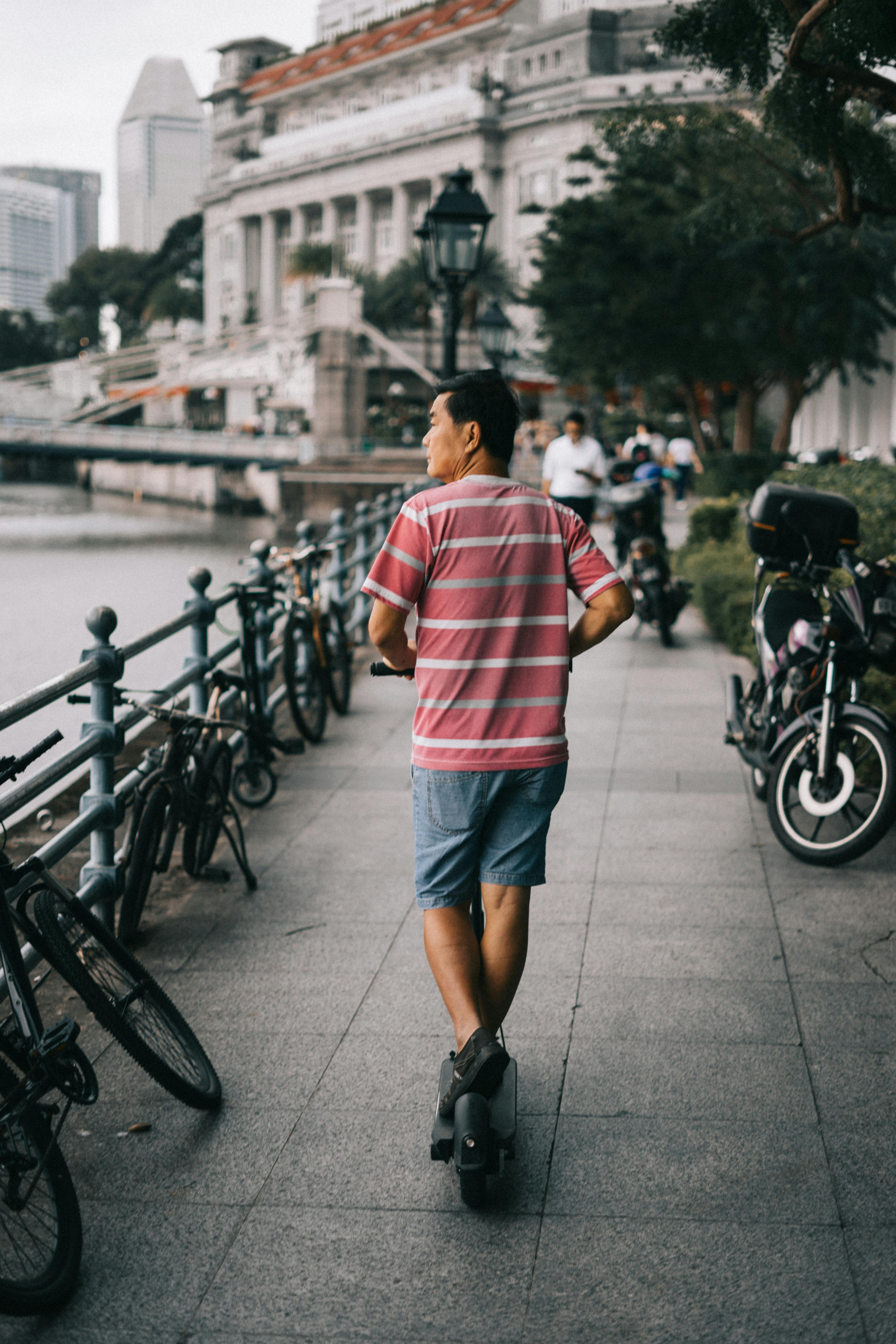 Man Riding Electric Scooter · Free Stock Photo