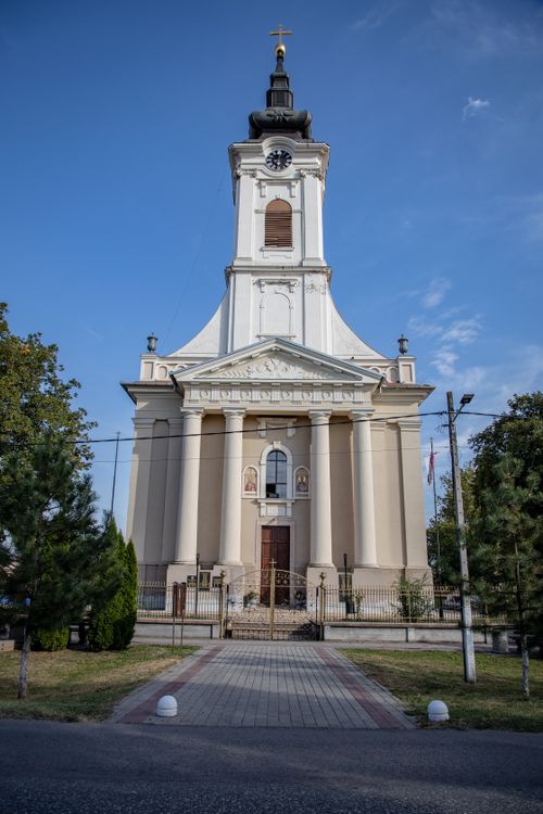 Free Vertical shot of St. Nicholas Church showcasing its facade and bell tower. Stock Photo
