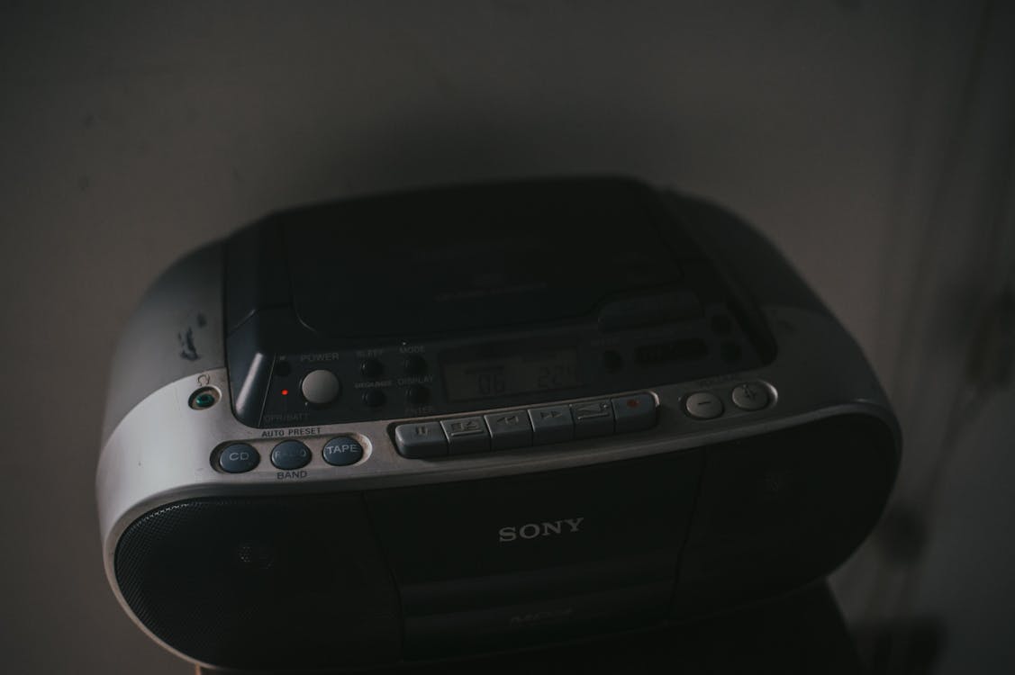 Free Black Sony Radio Beside Wall Stock Photo