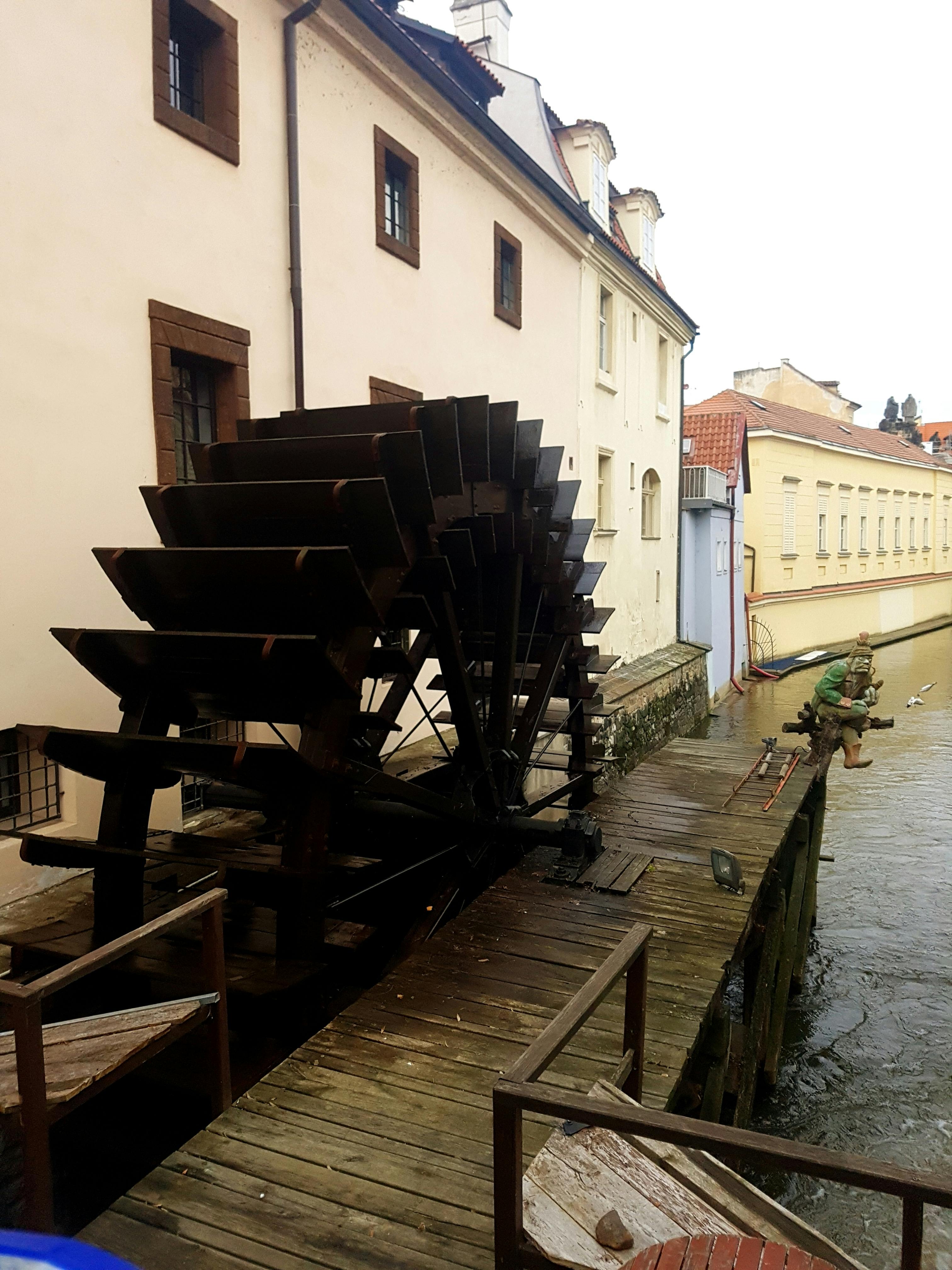 A dimly lit, abandoned hallway with peeling paint, creating a spooky and atmospheric setting.