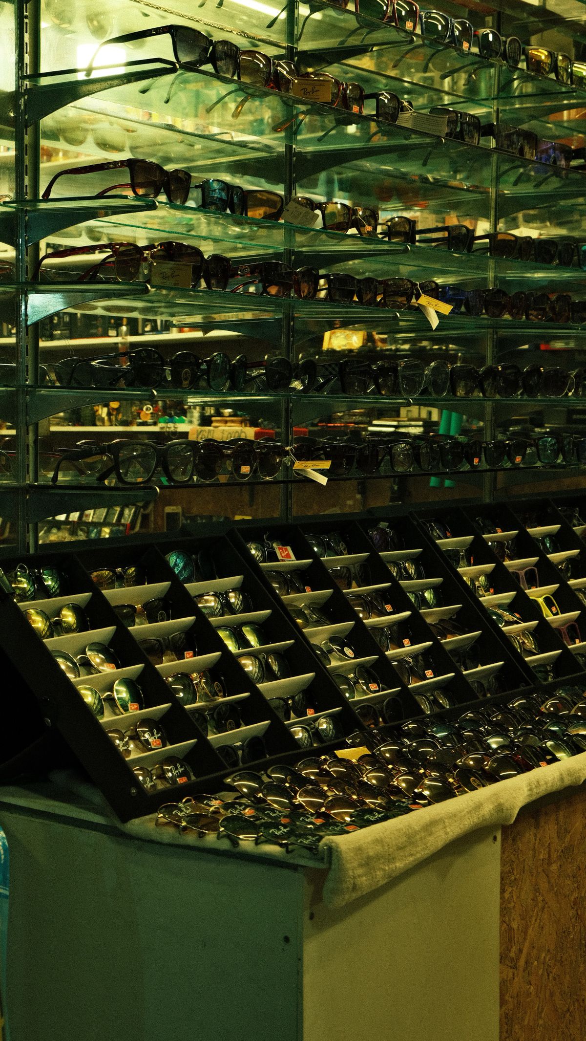 A wide selection of eyeglass frames displayed in an optical shop