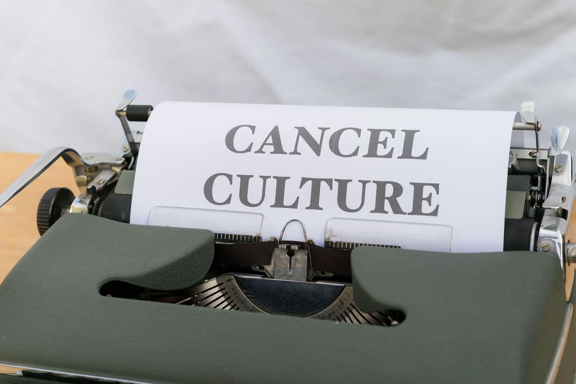 A typewriter with the word cancel culture on it