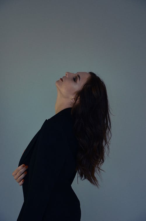 Brunette Posing in Elegant Jacket