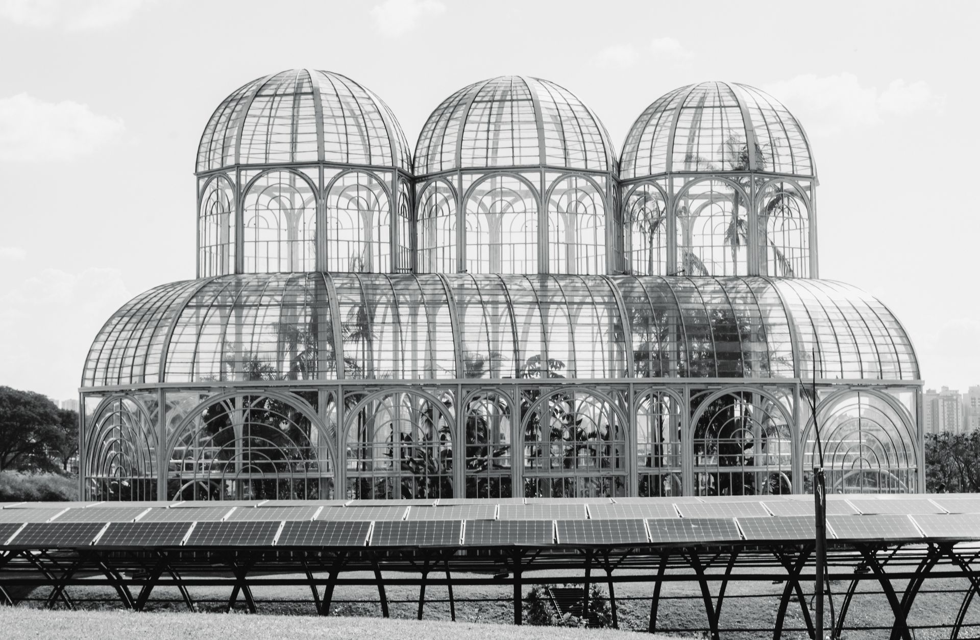 Modern greenhouse with solar panels in Curitiba's Botanical Garden, Brazil.