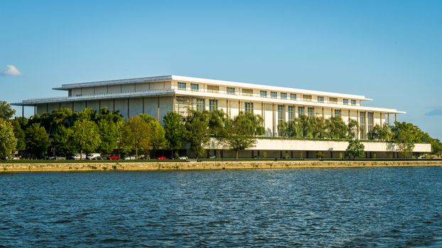 Visitors enjoying the sunset view from the Kennedy Center rooftop terrace.