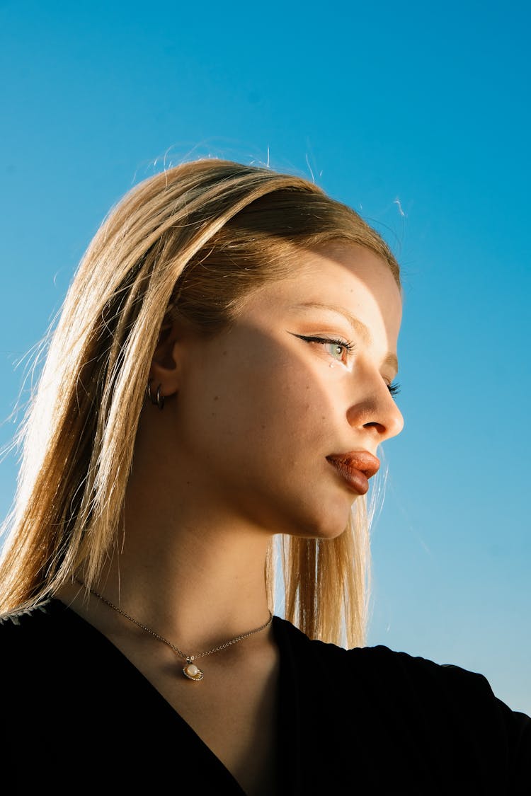 Blonde Woman With Sunlight On Face