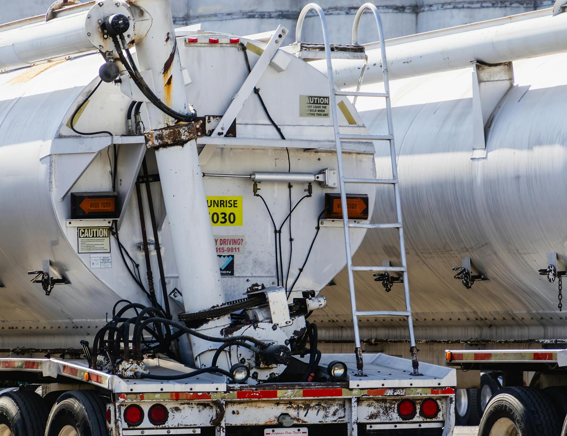 Close-up view of a tanker truck, used for logistics and cargo transportation.