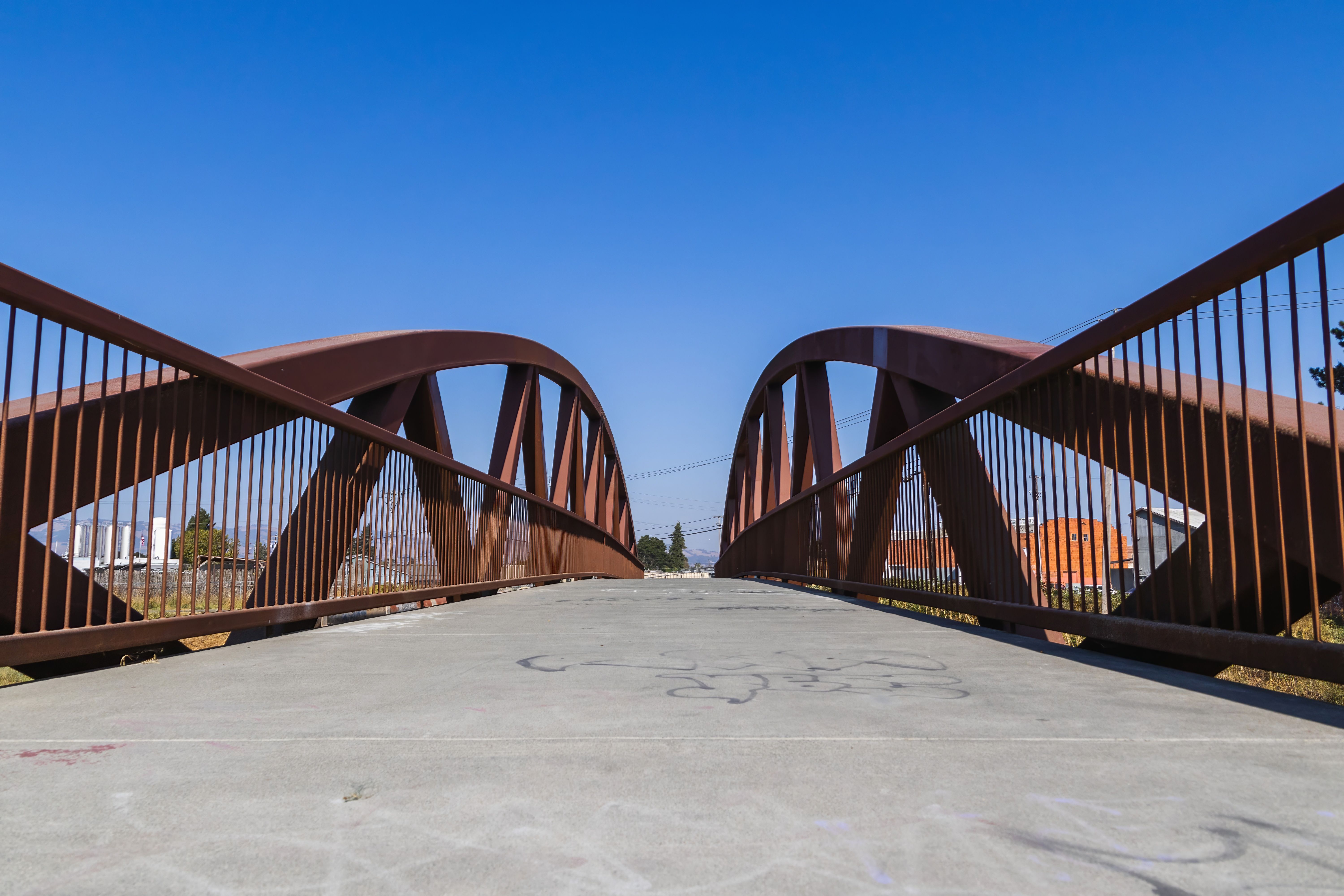 minimalist steel pedestrian footbridge