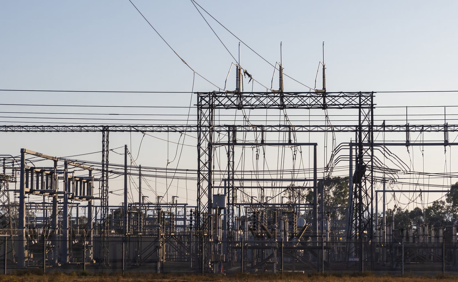The Impending Gridlock: How National Power Bottlenecks Are Impacting Enterprise Cloud Availability and Pricing 7 hybrid IT infrastructure energy efficiency consulting: power distribution substation used to assess cloud region power availability.