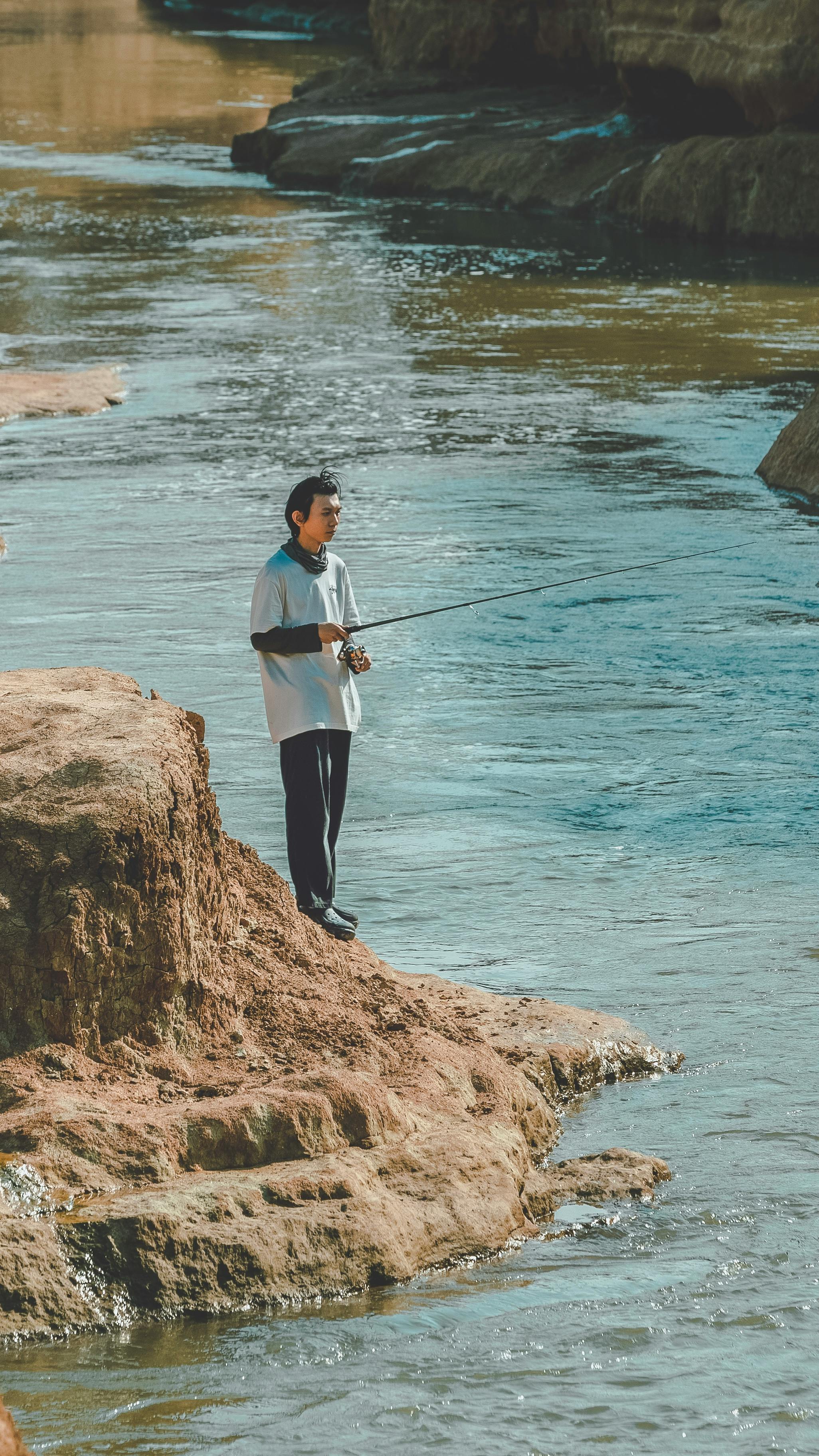 Person Holding Fishing String · Free Stock Photo