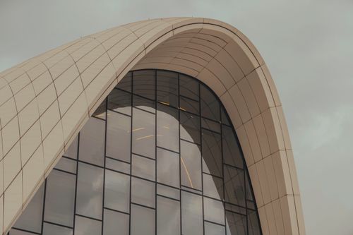 Free Close-up of the Heydar Aliyev Centre's modern facade in Baku, Azerbaijan. Stock Photo